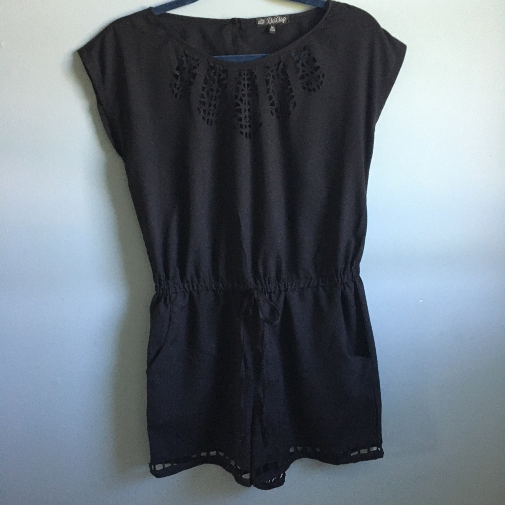 Short sleeved romper with cut outs